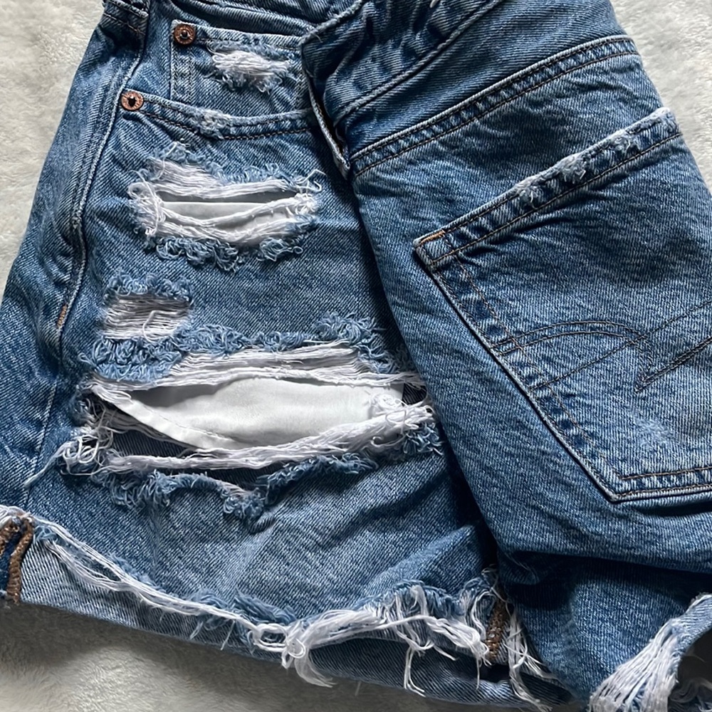 womens distressed mid wash denim shorts
